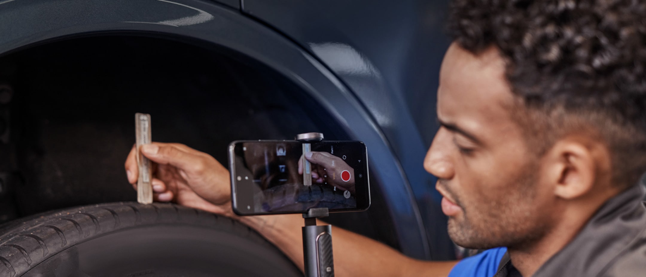 Man filming Kuga on his phone Man filming Kuga on his phone